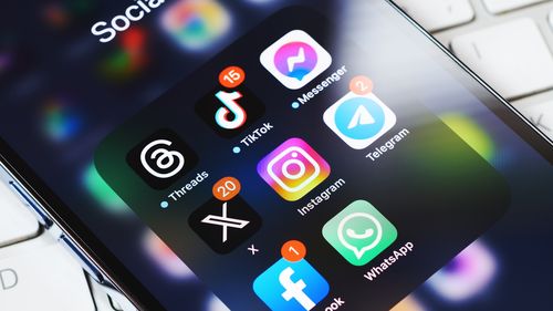 A view of a smartphone screen showing the icons for various apps, such as TikTok, Instagram, Facebook and WhatsApp. 