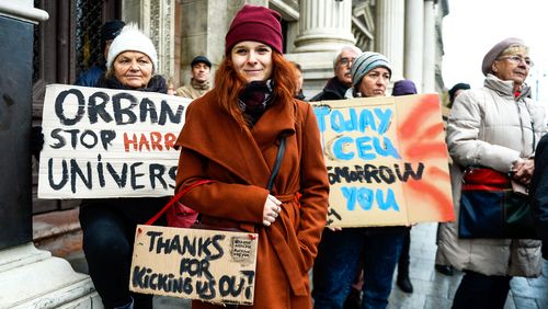 Photo showing people holding signs and demonstrating for the Central European University to remain in Budapest, November 2018.