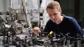 Jan Vogelsang adjusts mirrors in the attosecond lab.