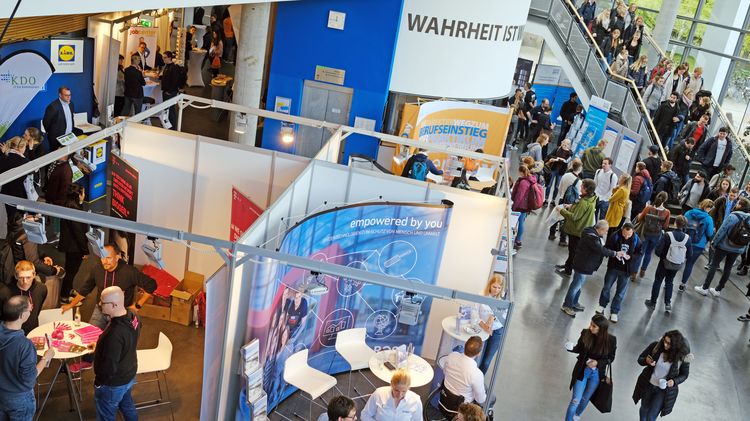Exhibition stands with students