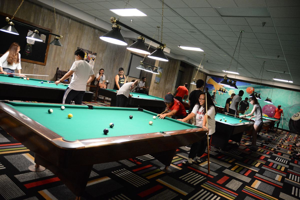 Students playing pool