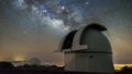 In the foreground you can see the open dome of a telescope, in the background the still slightly reddish evening sky, in which the Milky Way can already be seen in all its glory. 