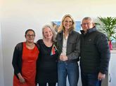 Prof Judy Peter and Leolyn Jackson meeting two employees of the International Office.