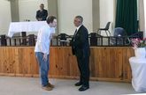 Krystoffer Dreps presenting a section of the composition to the King of the Griekwa, Paramount Chief Alan Andrew le Fleur.