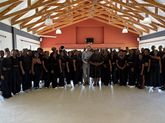 Krystoffer Dreps with the choir of the George Campus of Nelson Mandela University 
