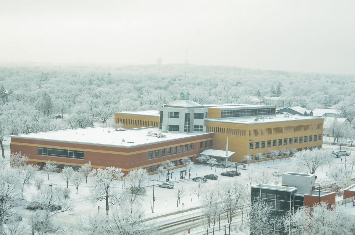 Frost on the trees and buildings of the Miller Centre