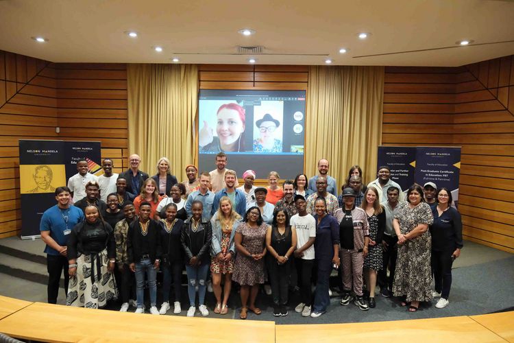 A group of people posing for a group photo during the Winter School at Nelson Mandela University.
