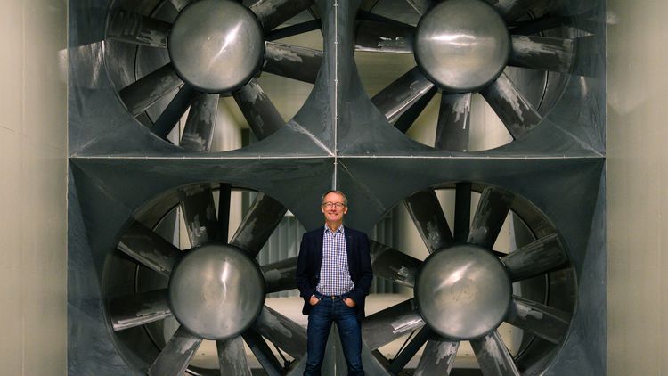View of the rotors with Peinke in front of it, he is about the same size as one of the rotors.