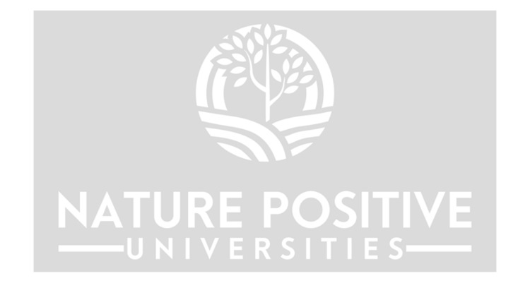 The image shows the logo of the Nature Positive University Initiative. It has a gray background and contains the symbol of a branch in a circle next to the lettering.