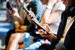 addict, addiction, adult, american, calling, caucasian, chatting, checking, communicate, communication, connecting, connection, device, digital, european, friend, friendship, fun, gathering, gen z, generation z, group, happy, looking, man, message, messaging, milennial, mobile phone, network, online, people, phone, reading, sending, sitting, smartphone, smiling, social, social media, technology, teenager, texting, together, togetherness, train, westerner, wireless, woman, working, young