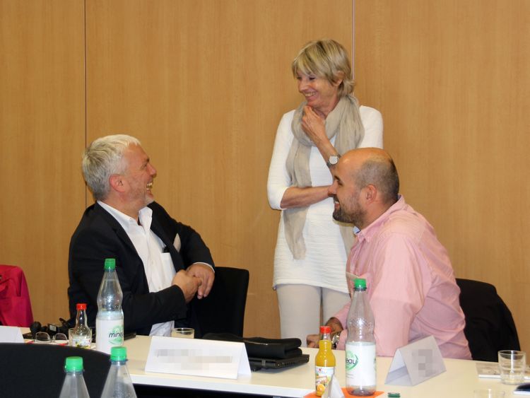 C3L Visiting - Foto Teilnehmer im Gespräch