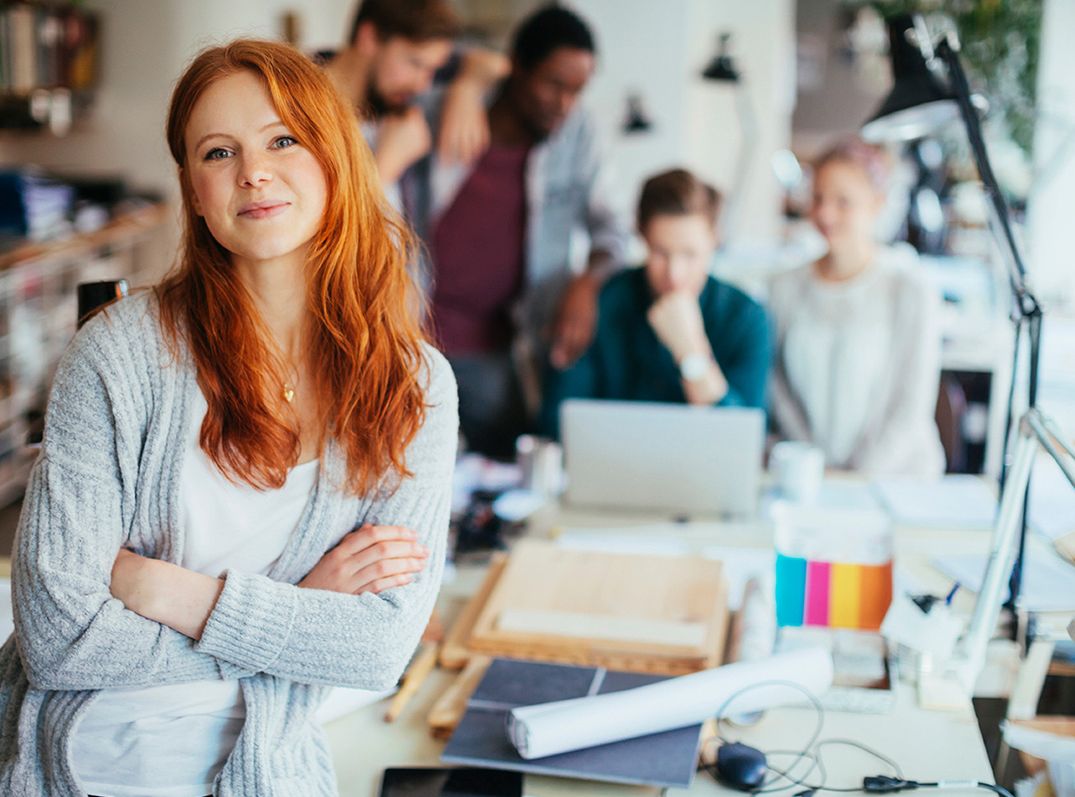 Portrait of a young woman in a modern office