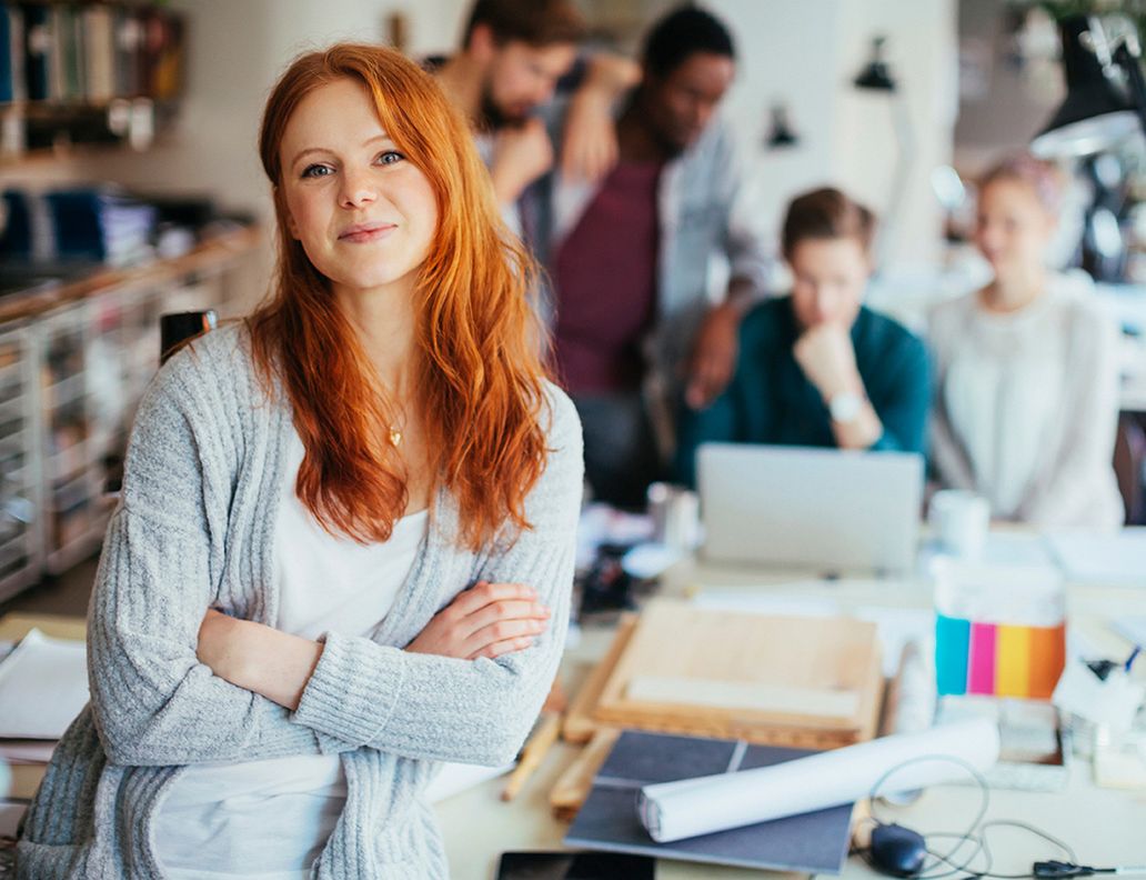 Portrait of a young woman in a modern office