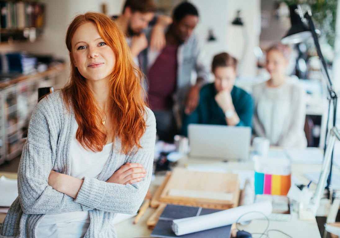 Portrait of a young woman in a modern office
