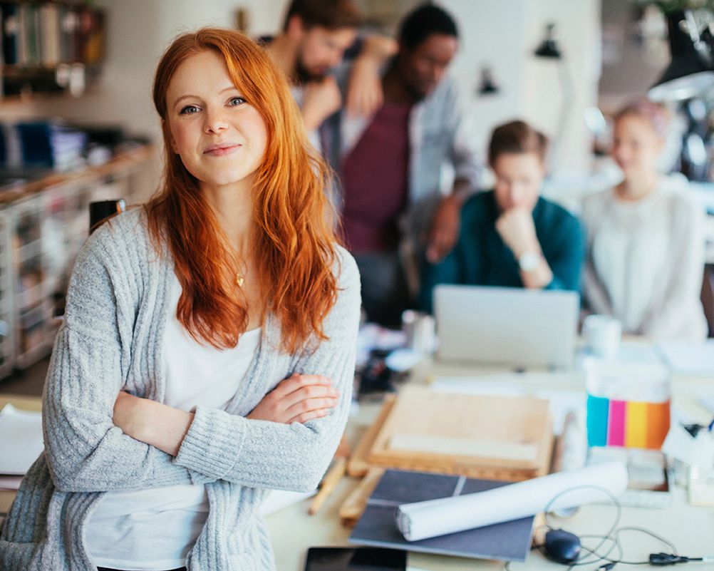Portrait of a young woman in a modern office