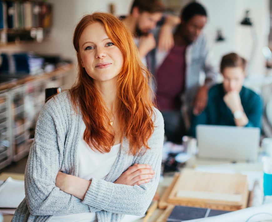 Portrait of a young woman in a modern office