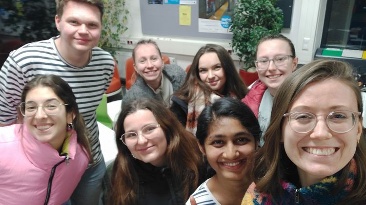 International students gather for a group photo during the Welcome Week game night.