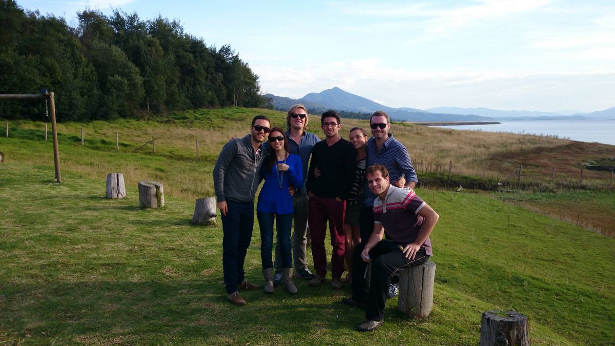 Group picture of international students in the green