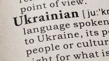 An extract, readable only in parts, from an English-language dictionary defining the Ukrainian language.