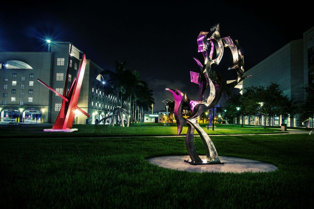 Art exhibition at night on campus